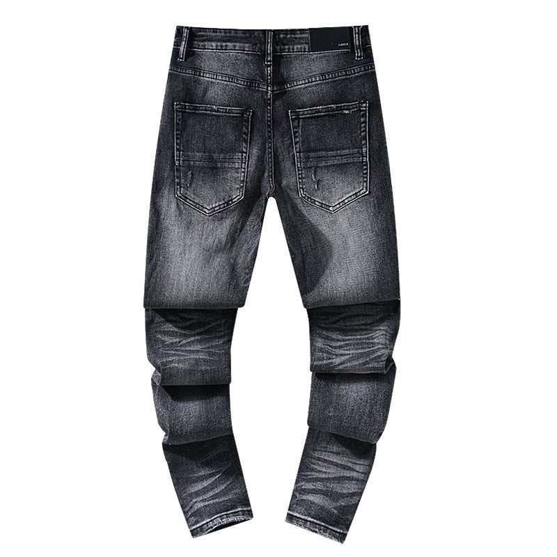 AMIRI Washed Black Distressed Jeans — back